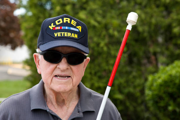 istock Blind Korean War veteran with a walking stick 1397723502