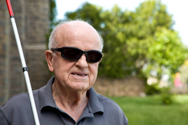 istock Blind man outdoors wearing dark glasses 1397723633