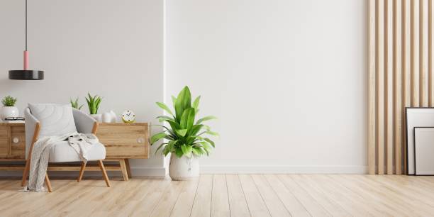 istock Interior with a gray armchair on empty white wall background. 1397723646