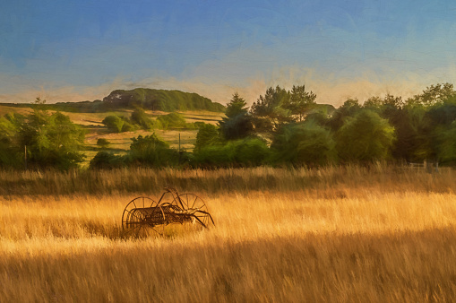 Digital painting of an antique hay rake in a farmers field at sunset in the Staffordshire Moorlands.