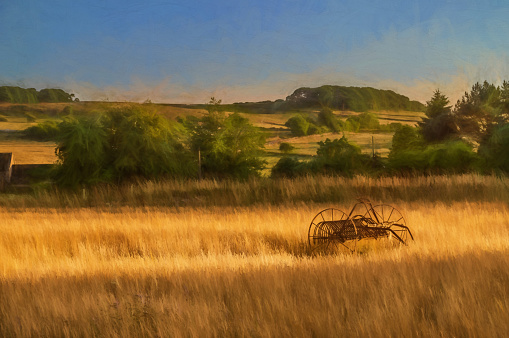 Digital painting of an antique hay rake in a farmers field at sunset in the Staffordshire Moorlands.