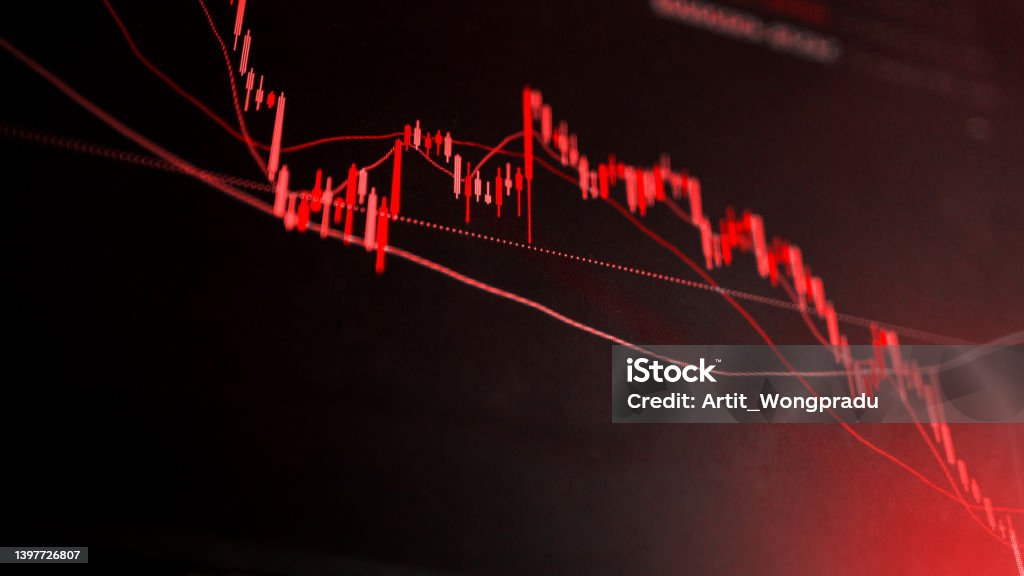 The red crashing market volatility of crypto trading with technical graph and indicator, red candlesticks going down without resistance, market fear and downtrend. Cryptocurrency background concept. TradingView Economy Stock Photo