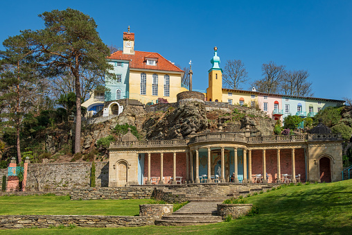 Wide angle view of colourful buildings at Portmeirion village. Portmeirion is a village in Gwynedd, North Wales.