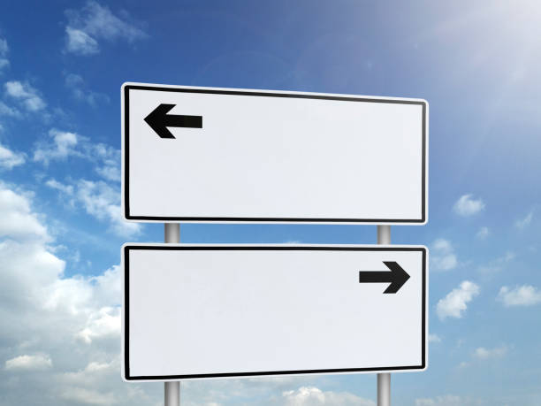istock Empty road sign against a background of blue sky with clouds 1397729361