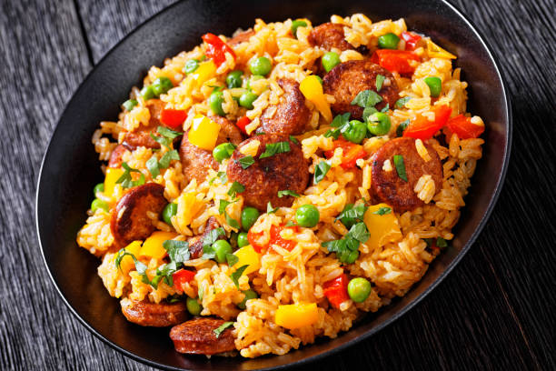istock smoked sausages with rice and vegetables, top view 1397730572