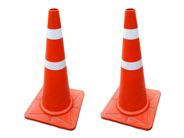 istock Traffic cone on the sidewalk isolated on white background 1397731100
