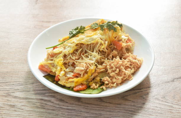 istock fried rice noodles with vegetable wrapped egg topping dry shredded pork 1397732001