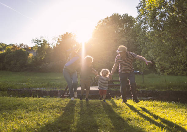 istock Happy multi-generation family spending day in nature 1397732574