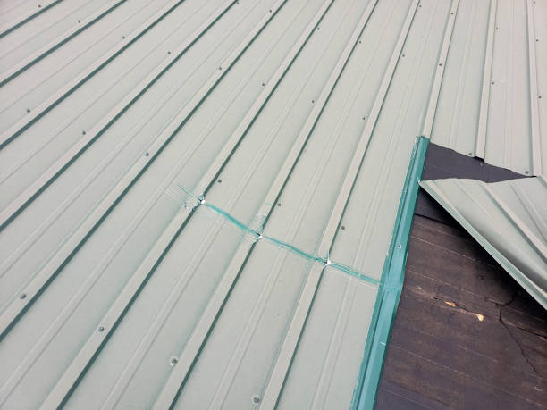 istock Metal roof damage 1397732690