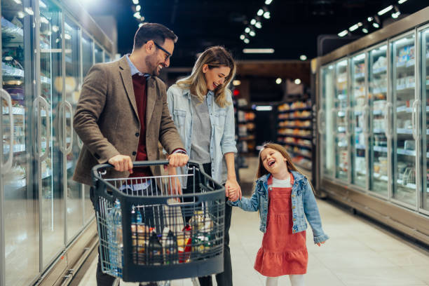 istock Young family shopping 1397732692