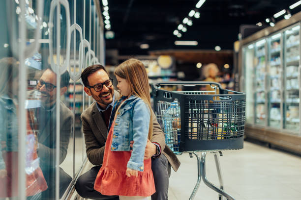 istock father and daughter picking favorite groceries 1397732749
