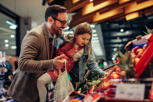 istock Grocery shopping with dad in supermarket 1397732948