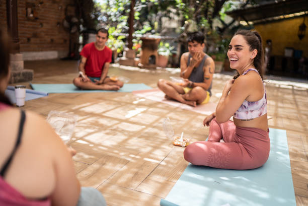 istock People talking and eating after a yoga class 1397734634