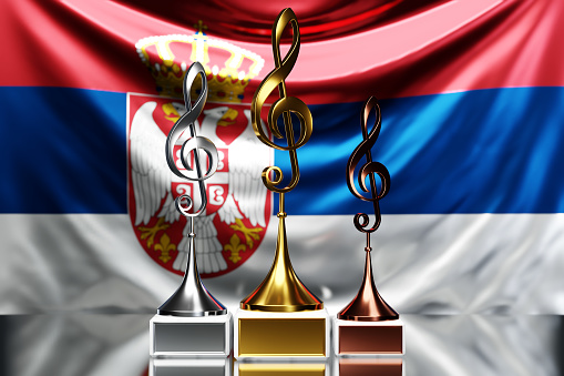Treble clef awards for winning the music award against the background of the national flag of Serbia, 3d illustration.