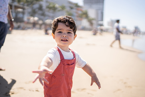 Portrait of little boy at the beach