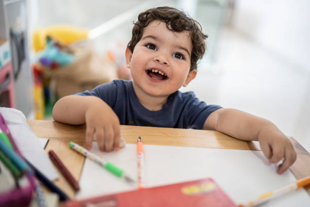 Portrait of little boy studying Portrait of little boy studying babyhood stock pictures, royalty-free photos & images