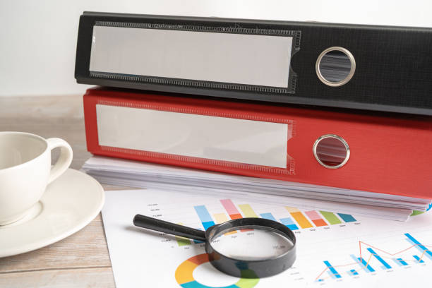 istock Binder data finance report business with graph analysis in office. 1397741234