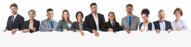 Business people holding a banner