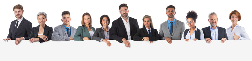 Group of business people holding a banner ad isolated on white background, copy space for text content