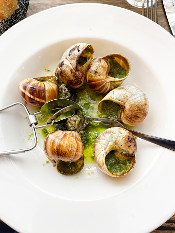 snails or escargots with shells and butter