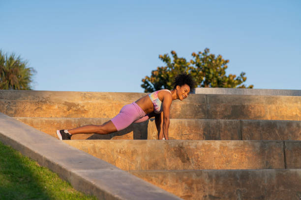 istock afro latin woman is outdoors doing physical exercises 1397747214