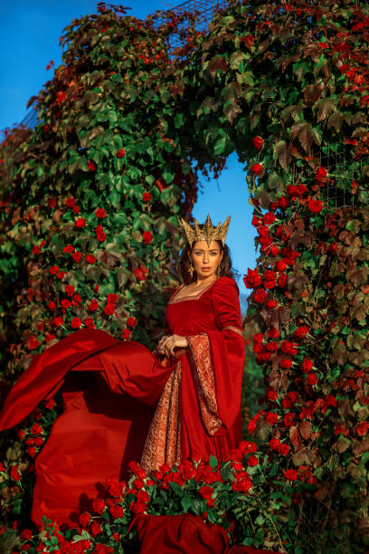 istock A beautiful brunette queen in a secret rose garden setting 1397747801
