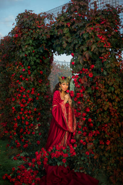 istock A beautiful brunette queen in a secret rose garden setting 1397747978