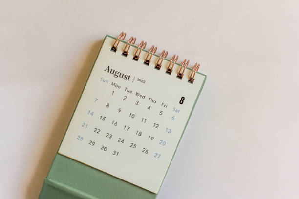 istock Desktop calendar for August 2022 on the table.Calendar for planning. 1397748058