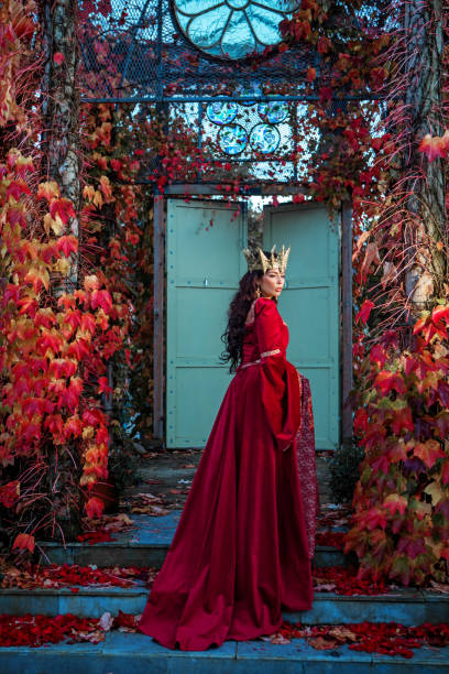 istock A beautiful brunette queen in a secret rose garden setting 1397748171