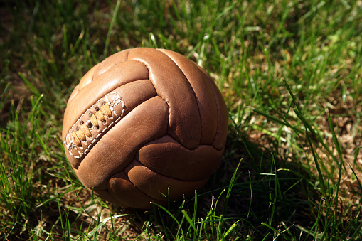 Retro soccer ball on grass