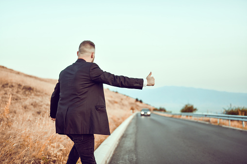 Hitchhiking Male Late For His Own Wedding