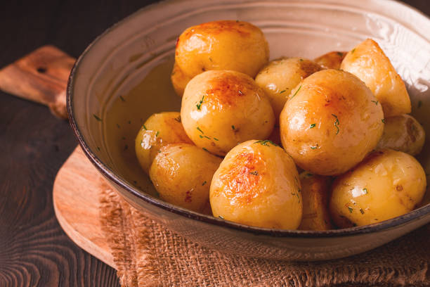 istock Fresh Cooked, new potatoes,with dill, on a wooden table, selective focus. close-up, toning, no people, 1397756742