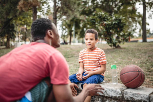 istock Father and son playing basketball 1397756914