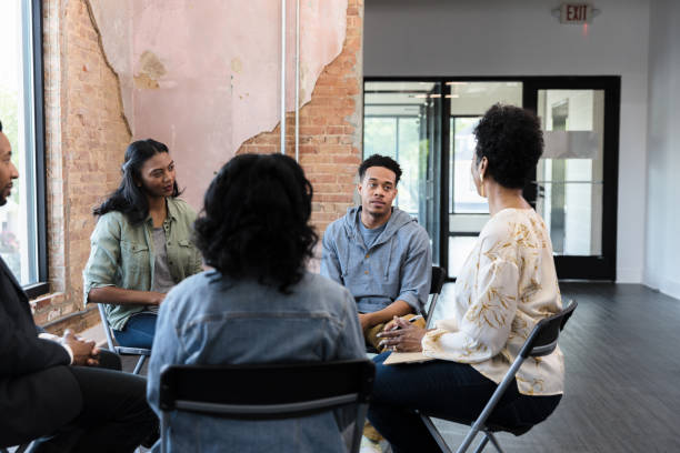 istock Young adults listen to the therapist 1397757323
