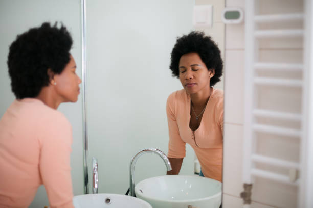 istock Middle aged woman in the bathroom 1397757591