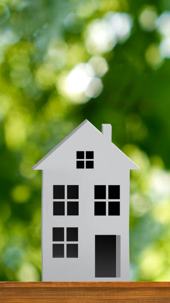 istock 3d image of a house against green background 1397758316