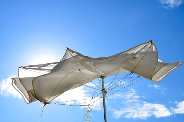 Flying up umbrella with windy weather