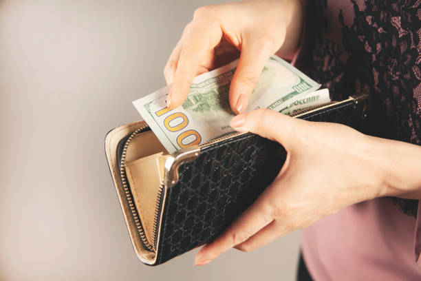 istock woman hand money 1397760878