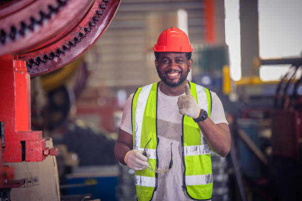 istock American worker working in factory,African american black man are operator control machine factory industrial 1397761263