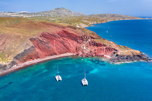 Beautiful scenery of red sand beach in akrotiri village Santorini, Greece.