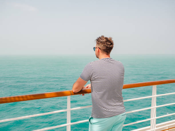 istock Fashionable man standing on the empty deck 1397766970