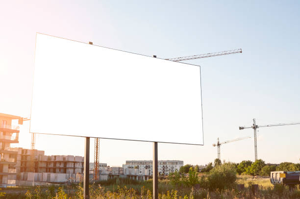 istock Blank white billboard for advertisement in front of the construction site 1397775937