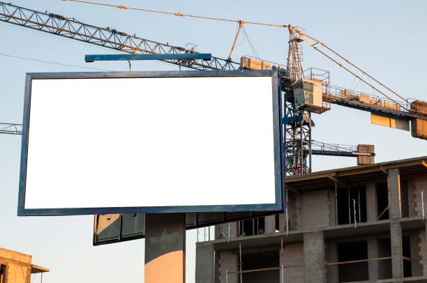 istock Blank white billboard for advertisement in front of the construction site 1397775956