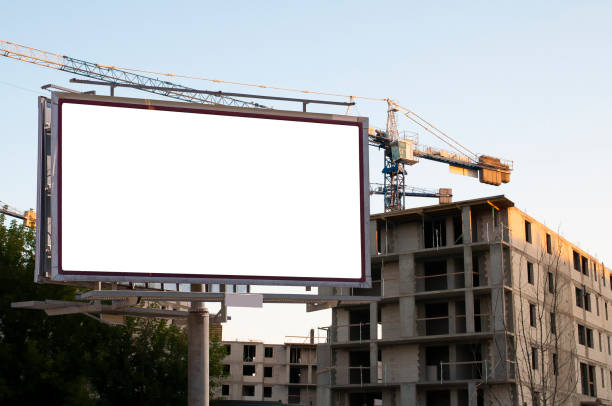 istock Blank white billboard for advertisement in front of the construction site 1397775968