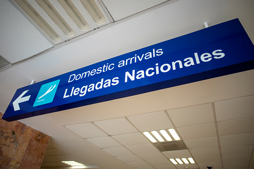 arrivals sign at the airport
