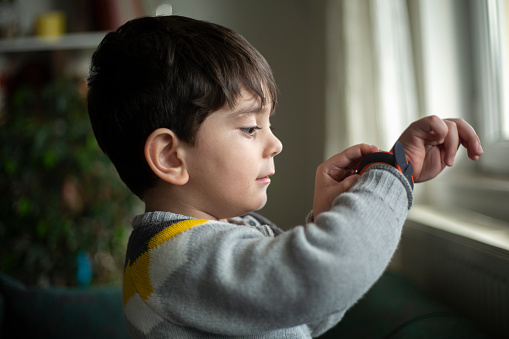 Smart watch on the boy's hand