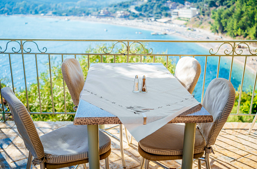 Beautiful view over table, blue sea on the background