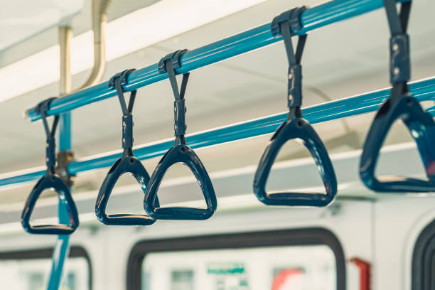 istock Close-up of plastic handles for standing passengers safety in public transportation, selective focus 1397781993