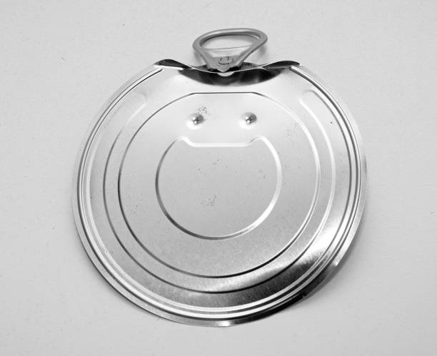istock Open metal can lid on white background 1397783156