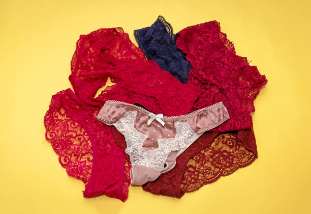 Sexy lace underwear pile stock photo